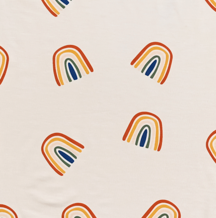 Kyte Baby Printed Crib Sheet Rust Rainbow Oat